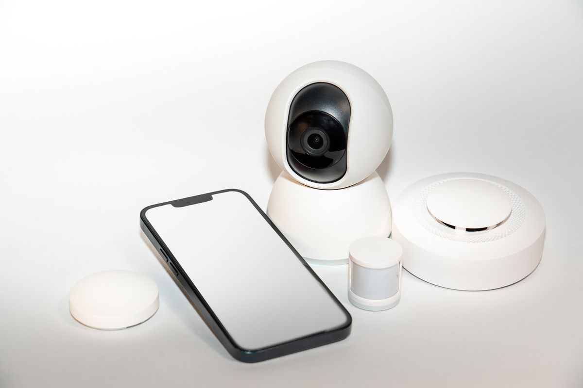 Home security system with indoor camera, motion sensor and smartphone app